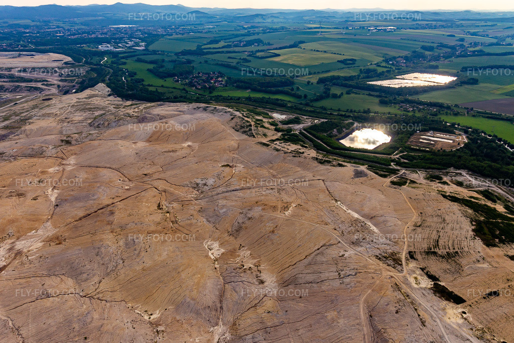 Aerial view: Exploited areas in the opencast brown coal mine 