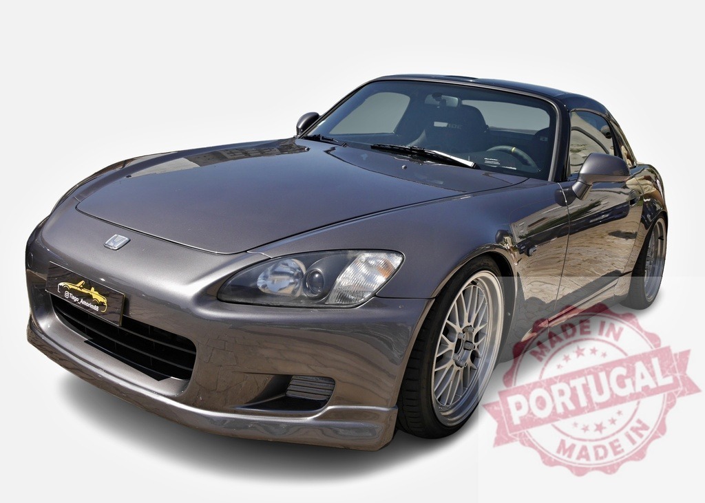 Honda S2000 showing its tuning potential, parked on a sunny day | Grey Honda S2000 with tuning parts, parked and shining under the sun - Realisiert mit Pictrs.com