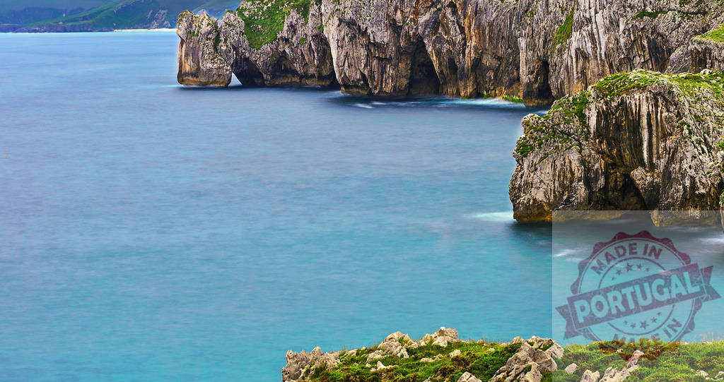 Turquoise sea washing rocky cliffs in Asturias, Spain | Beautiful turquoise sea washing rocky cliffs in Asturias, Spain, creating a picturesque seascape - Realized with Pictrs.com