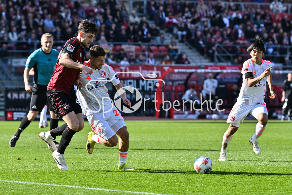 1. FC Nürnberg - Fortuna Düsseldorf | NUREMBERG, GERMANY - 07. MARCH:  im Duell  Ondrej KARAFIAT (1. FC Nuernberg 44) und Florent MUSLIJA (Fortuan Düsseldorf 24) während dem Match zwischen dem 1. FC Nürnberg und Fortuna Düsseldorf am 25. Spieltag der 2. Bundesliga im Max Morlock Stadion / DFL REGULATIONS PROHIBIT ANY USE OF PHOTOGRAPHS AS IMAGE SEQUENCES AND/OR QUASI-VIDEO
