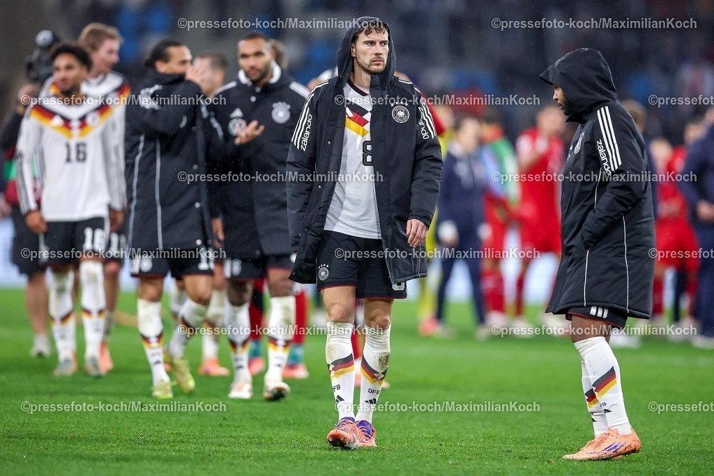 DFB14112501142 | 14.11.2025, Fußball, Länderspiel, WM-Qualifikation Europa, Deutschland - Luxemburg, Stade de Luxembourg (Croix de Gasperich, Luxemburg), 9. Spieltag, Saison 2025 2026: Leon Goretzka (GER #08) im regen  Regulations prohibit any use of photographs as image sequences and or quasi-video.