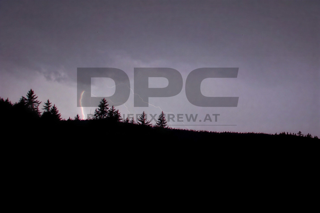 Lightning Storm over the Almenland | Multiple lightning strikes illuminate the night sky over the Almenland region in Austria during a powerful summer thunderstorm. - Realisiert mit Pictrs.com