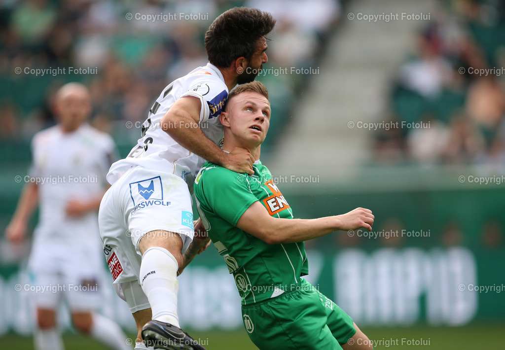A_LUI_14042024_18 | SPORT,FUSSBALL.ADMIRAL BUNDESLIGA SK RAPID-AUSTRIA KLAGENFURT14.04.2024 IM BILD:ISAK JANSSON (RAPID) UND KOSMAS GKEZOS (KLAGENFURT) FOTO.FOTOLUI/MW