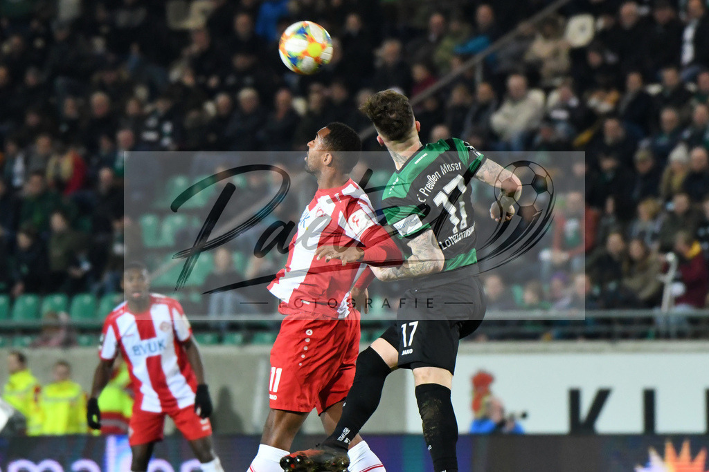 20200214_SCPFWK_0091 | Fussball, Herren: Saliou Sane (FC Wuerzburger Kickers) und Jan Loehmannsroeben (SC Preussen Muenster) im Zweikampf waehrend des Spiels der 3. Liga zwischen SC Preussen Muenster und FC Wuerzburger Kickers im Preussenstadion am 14.02.2020 in Muenster, Deutschland.DFB / DFL REGULATIONS PROHIBIT ANY USE OF PHOTOGRAPHS AS IMAGE SEQUENCES AND/OR QUASI-VIDEO. - Realisiert mit Pictrs.com