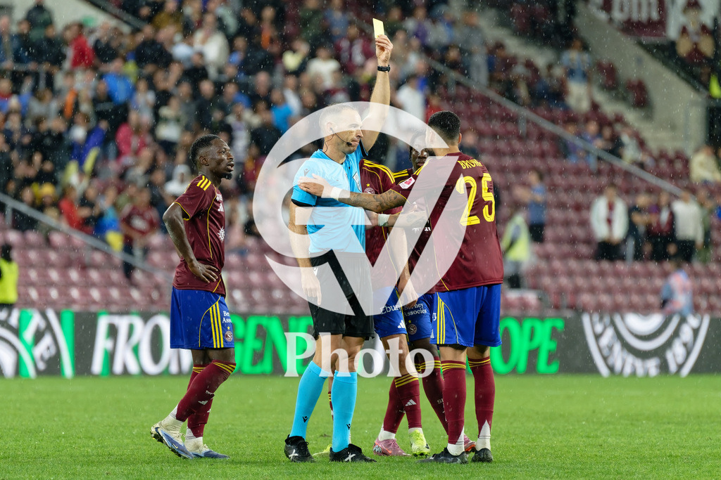 UEFA Conference League Play-offs 2nd leg - Servette FC v FC Shakhtar Donetsk | Dylan Bronn (25 Servette FC) receives a yellow by Guillermo Cuadra Fernandez referee  during the UEFA Conference League Play-offs 2nd leg match between Servette FC and FC Shakhtar Donetsk at Stade de Geneve in Geneva, Switzerland