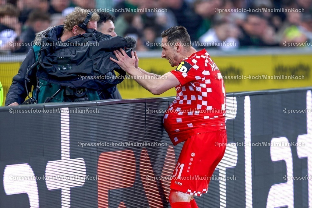 BMG07032501084 | 07.03.2025, Fußball, Borussia Mönchengladbach - 1.FSV Mainz 05, 1. Fußball Bundesliga, Borussia-Park, Saison 2024 2025: Torjubel nach dem 2:0 durch Dominik Kohr (Mainz05 #31). DFB regulations prohibit any use of photographs as image sequences and or quasi-video.
