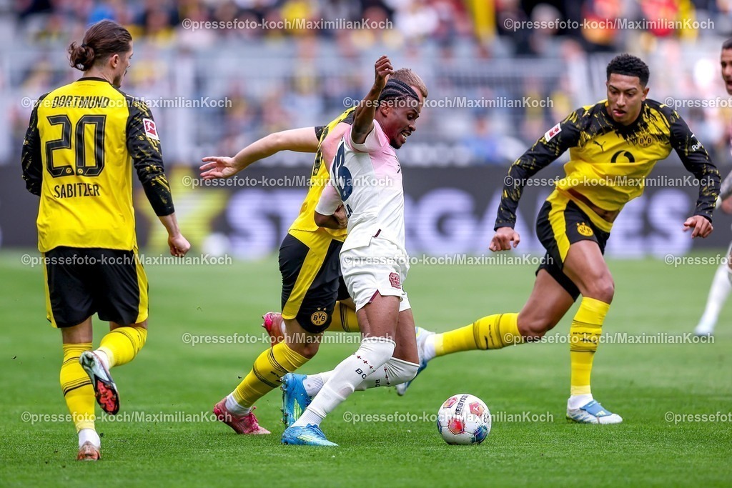 BVB11042601025 | 11.04.2026, Fußball, Borussia Dortmund - Bayer 04 Leverkusen, 1. Fußball Bundesliga, 29. Spieltag, Signal Iduna Park, Saison 2025 2026: Nathan Tella&nbsp;(Bayer04 Leverkusen #23) im Zweikampf gegen  Marcel Sabitzer&nbsp;(BVB #20) Julian Ryerson&nbsp;(BVB #26) Jobe Bellingham&nbsp;(BVB #07)  DFB regulations prohibit any use of photographs as image sequences and or quasi-video.