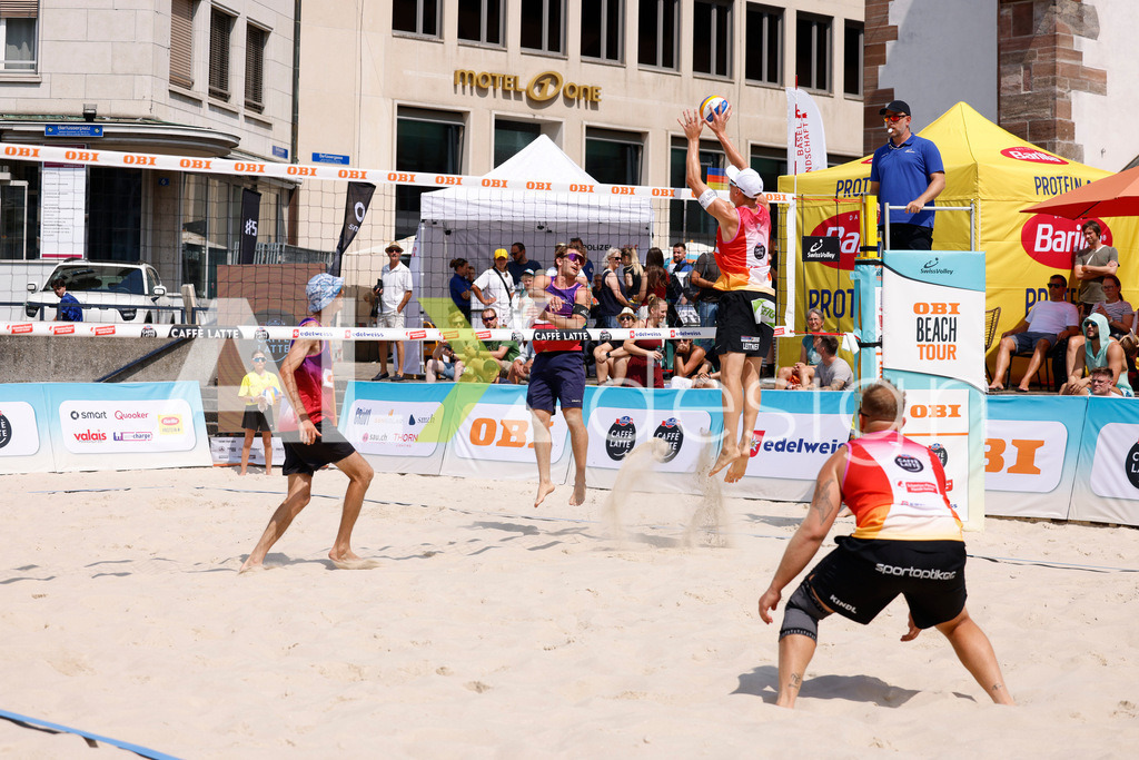 Obi BeachTour 2026 - Basel | BASEL, SWITZERLAND - JULY 19: YVES HAUSSENER (SUI) attack / spike during the Obi BeachTour 2026 match between HAGENBUCH / HAUSSENER (SUI) and LEITNER / KINDL (AUT) at Barfüsserplatz on July 19, 2026 in Basel, Switzerland. - Realisiert mit Pictrs.com
