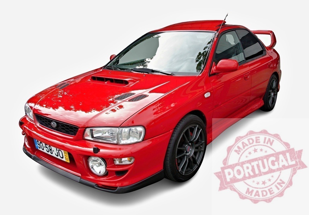 Red Subaru Impreza WRX STI showcasing its tuning parts | Tuning enthusiast showcasing his customized Subaru Impreza WRX STI with aftermarket parts - Realized with Pictrs.com