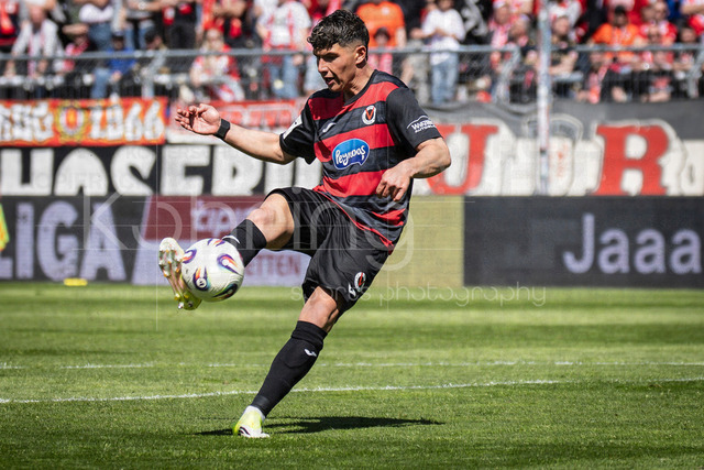 German 3rd Division, Viktoria Koeln vs. Energie Cottbus, 26.04.2026 | KOELN, GERMANY - APRIL 26, 2026:  Taylan Duman (FC Viktoria Koeln, 4) shoots on the goal during the 3rd division match on gameday 35 between Viktoria Koeln vs. Energie Cottbus at the Sportpark Hoehenberg on April 26, 2026 in Koeln, Germany. DFL REGULATIONS PROHIBIT ANY USE OF PHOTOGRAPHS AS IMAGE SEQUENCES AND/OR QUASI-VIDEO.