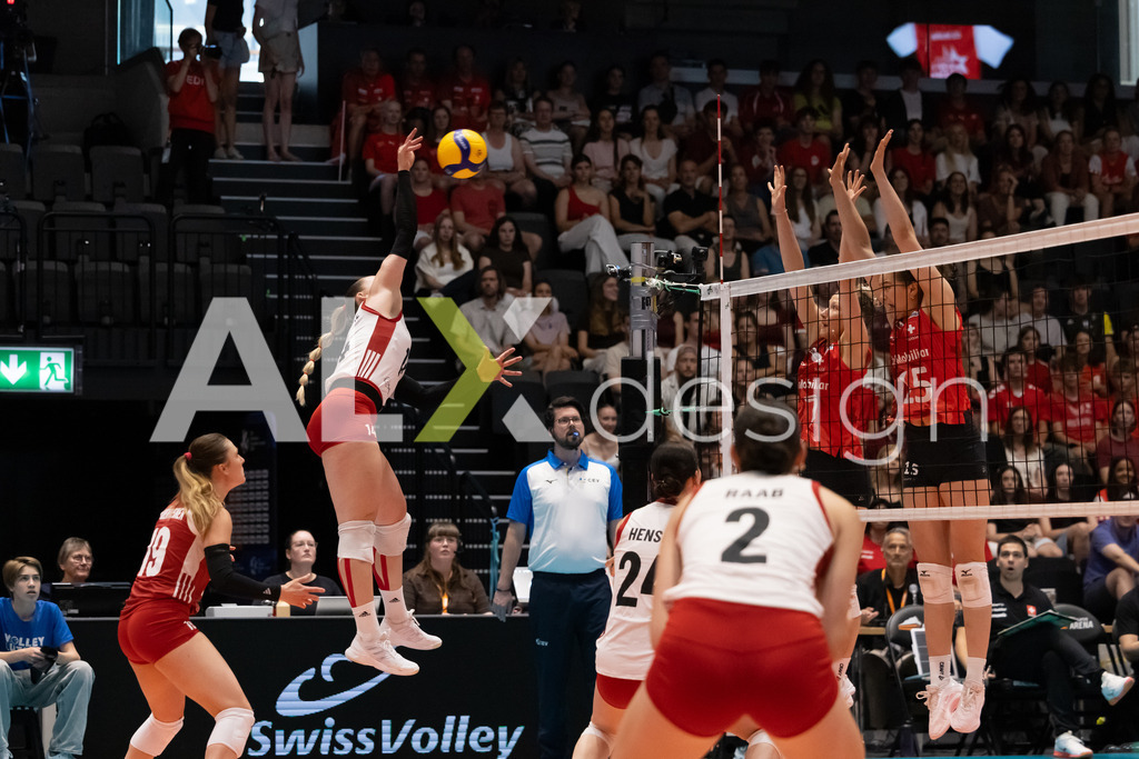 Austria v Switzerland - CEV European League Women | KRIENS, SWITZERLAND - JUNE 14: KORA MARINA SCHABERL of Austria attack / spike against MÉLINE PIERRET and ALIX DE MICHELI of Switzerland double block during the CEV European League match between Austria and Switzerland at Pilatus Arena on June 14, 2026 in Kriens, Switzerland. - Realisiert mit Pictrs.com