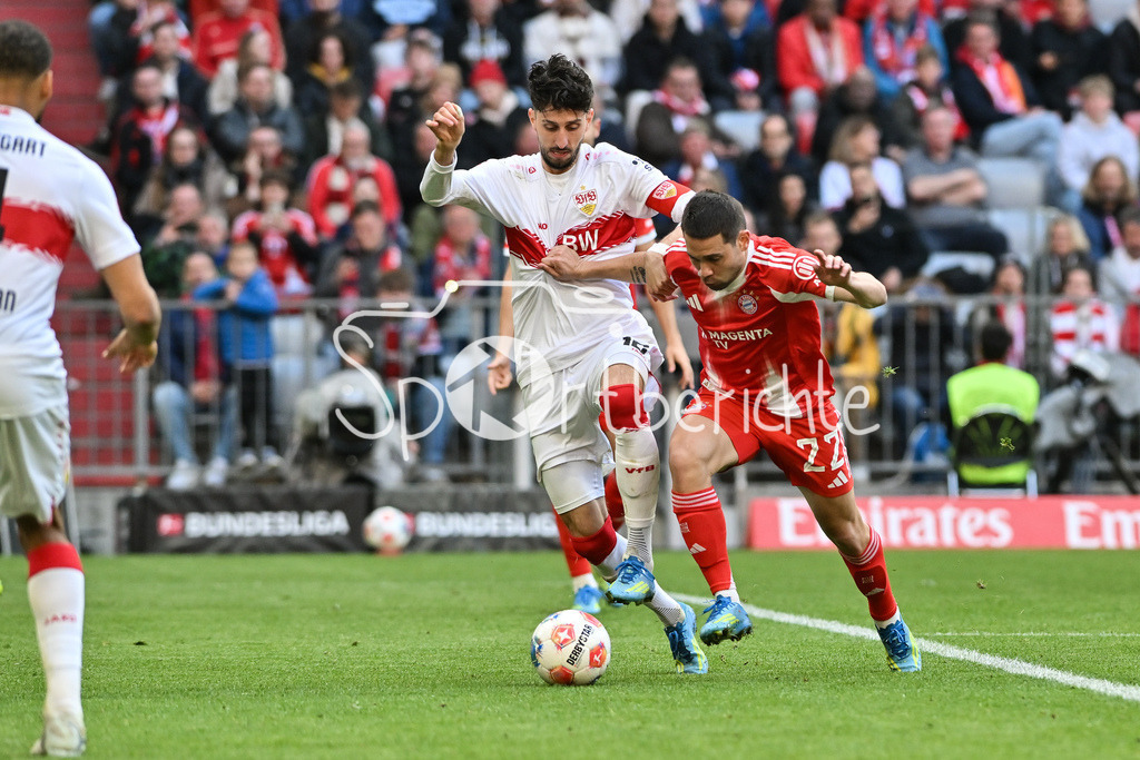 FC Bayern München - VfB Stuttgart | MUNICH, GERMANY - 19. APRIL: tackle between ATAKAN KARAZOR (VFB STUTTGART 16) and Raphael GUERREIRO (FC Bayern Munich 22) during the Bundesliga Match between FC Bayern Munich vs. VfB Stuttgart at Matchday 30 at Allianz Arena / DFL REGULATIONS PROHIBIT ANY USE OF PHOTOGRAPHS AS IMAGE SEQUENCES AND/OR QUASI-VIDEO