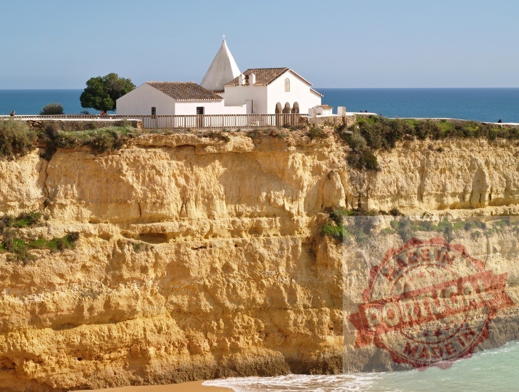 Nossa Senhora da Rocha chapel on Portugal cliffside | Nossa Senhora da Rocha chapel standing on a dramatic cliff overlooking the ocean in Algarve - Realized with Pictrs.com