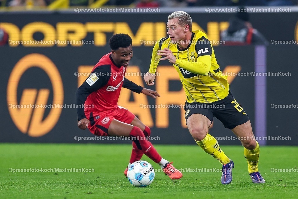 BVB10012502278 | 10.01.2025, Fußball, Borussia Dortmund - Bayer 04 Leverkusen, 1. Fußball Bundesliga, 16. Spieltag, Signal Iduna Park, Saison 2024 2025: Nathan Tella (Bayer04 Leverkusen #19) im Zweikampf gegen Julian Ryerson (BVB #26)DFB regulations prohibit any use of photographs as image sequences and or quasi-video.