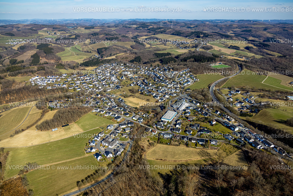 Olpe250308168Rhode | Luftbild, Ortsansicht Wohngebiet Rohde, Waldgebiet Hügellandschaft, Kirche Pfarrei St. Cyriakus Rhode im Ortszentrum, Franz-Hitze-Schule - kath. Grundschule, Rhode, Olpe, Sauerland, Nordrhein-Westfalen, Deutschland