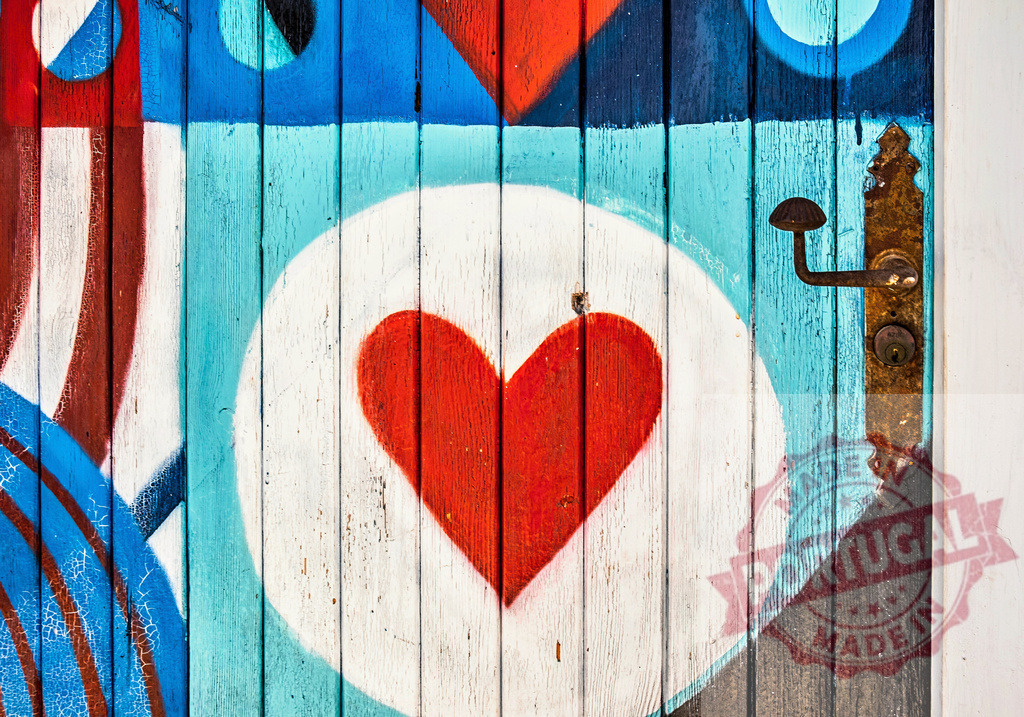 Colorful street art heart painted wooden door design | Painted wooden door featuring a red heart in urban graffiti art style - Realized with Pictrs.com