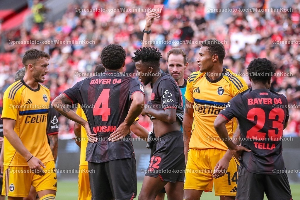 B0405082501129 | 05.08.2025, Fußball, Bayer 04 Leverkusen - Pisa Sporting Club, Testspiel, Saisoneröffnung in der BayArena, Saison 2025 2026: Rote Karte Platzverweis für Edmond Tapsoba (Bayer04 #12) nach Foulspiel an Henrik Meister (Pisa SC #14)  DFB regulations prohibit any use of photographs as image sequences and or quasi-video.