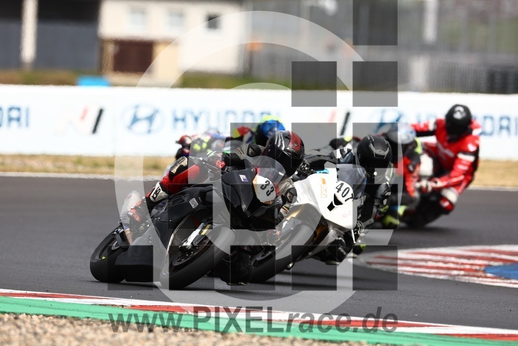 0033-20240726_02463 | Schöne Erinnerungen an spannende Momente - das festzuhalten ist unser Job. PIXELrace.de ist seit 2003 auf den Rennstrecken Europas unterwegs um die Action draußen beim Fahren und die wunderbare Stimmung imm Fahrerlager für euch einzufangen.