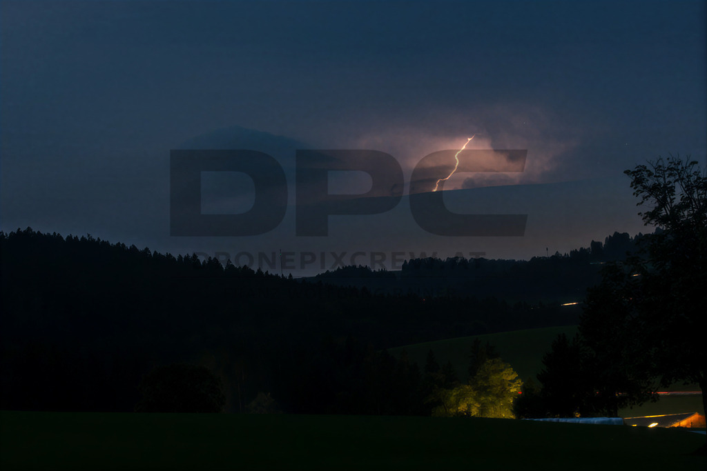 Lightning Storm over the Almenland | Multiple lightning strikes illuminate the night sky over the Almenland region in Austria during a powerful summer thunderstorm. - Realisiert mit Pictrs.com