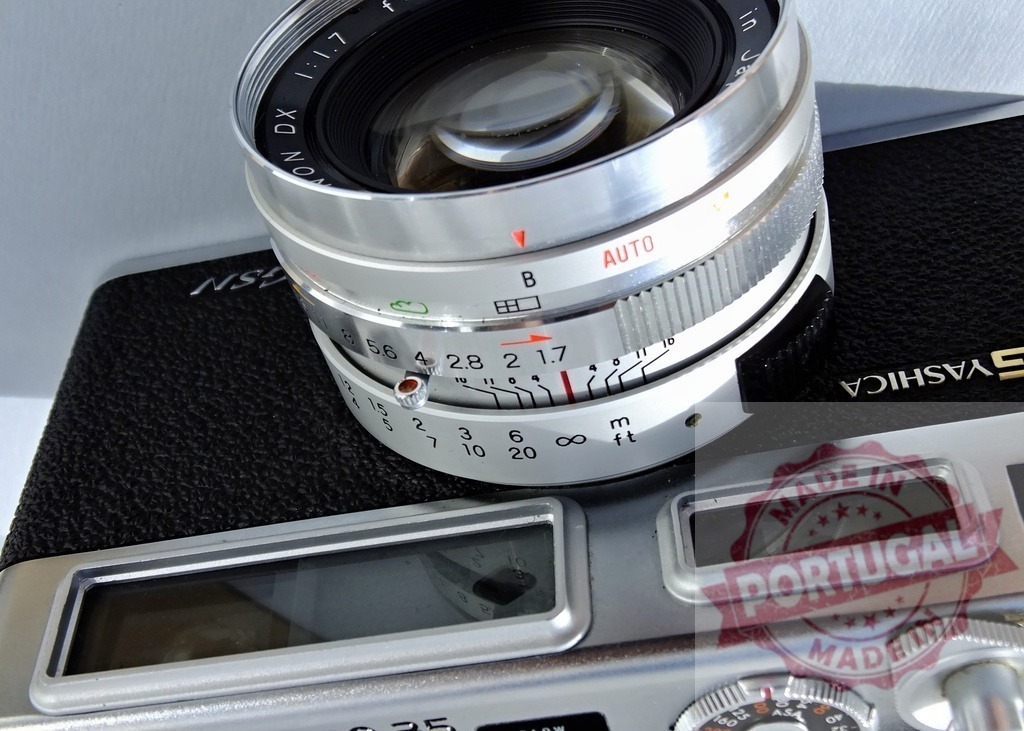 Yashica Electro 35 GSN rangefinder camera showing lens details | Yashica Electro 35 GSN rangefinder camera, a vintage analog photography tool - Realized with Pictrs.com