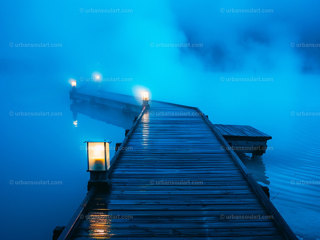 Lit Foggy Lake Boardwalk At Night | This atmospheric scene captures a foggy lake with a glowing boardwalk at night, radiating mystery and calm. Ideal for adding a sense of depth and tranquility to your home decor. - Realisiert mit Pictrs.com
