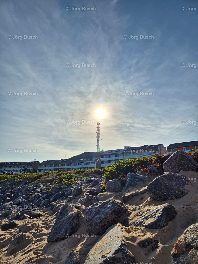 Sendemast mit Sonne_ Helgoland | Dieser Shop bietet Fotos und Videos aus den Bereichen Fallschirmspringen, Landschaft und Luftbild - Realisiert mit Pictrs.com
