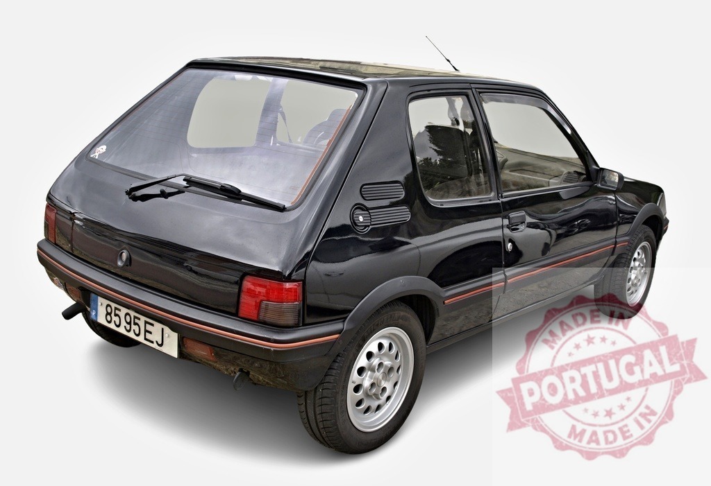 Black Peugeot 205 generation 1 parking on white background | Rear view of a black Peugeot 205 generation 1 parking on a white background - Realized with Pictrs.com