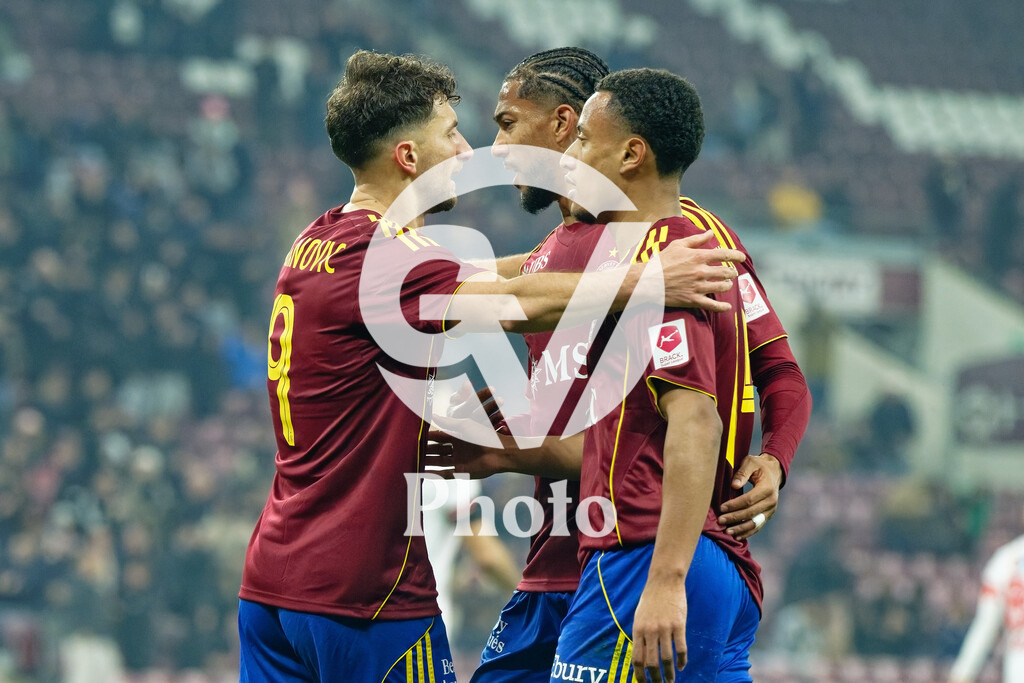 Brack Super League - Servette FC v FC Sion | Miroslav Stevanovic (9 Servette FC) celebrates after scoring his team's first goal with teammates Florian Aye (97 Servette FC)  Lilian Njoh (14 Servette FC)  during the Brack Super League match between Servette FC and FC Sion at Stade de Geneve in Geneva, Switzerland