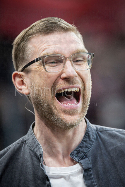 DFB Cup semifinal match Bayer 04 Leverkusen vs. FC Bayern Munich, 22.04.2026 | LEVERKUSEN, GERMANY - APRIL 22, 2026: World Champion 2014 Per Mertesacker laughing before the German DFB Cup semifinal match between Bayer 04 Leverkusen vs. FC Bayern Munich at BayArena on April 22, 2026 in Leverkusen, Germany. DFL REGULATIONS PROHIBIT ANY USE OF PHOTOGRAPHS AS IMAGE SEQUENCES AND/OR QUASI-VIDEO.