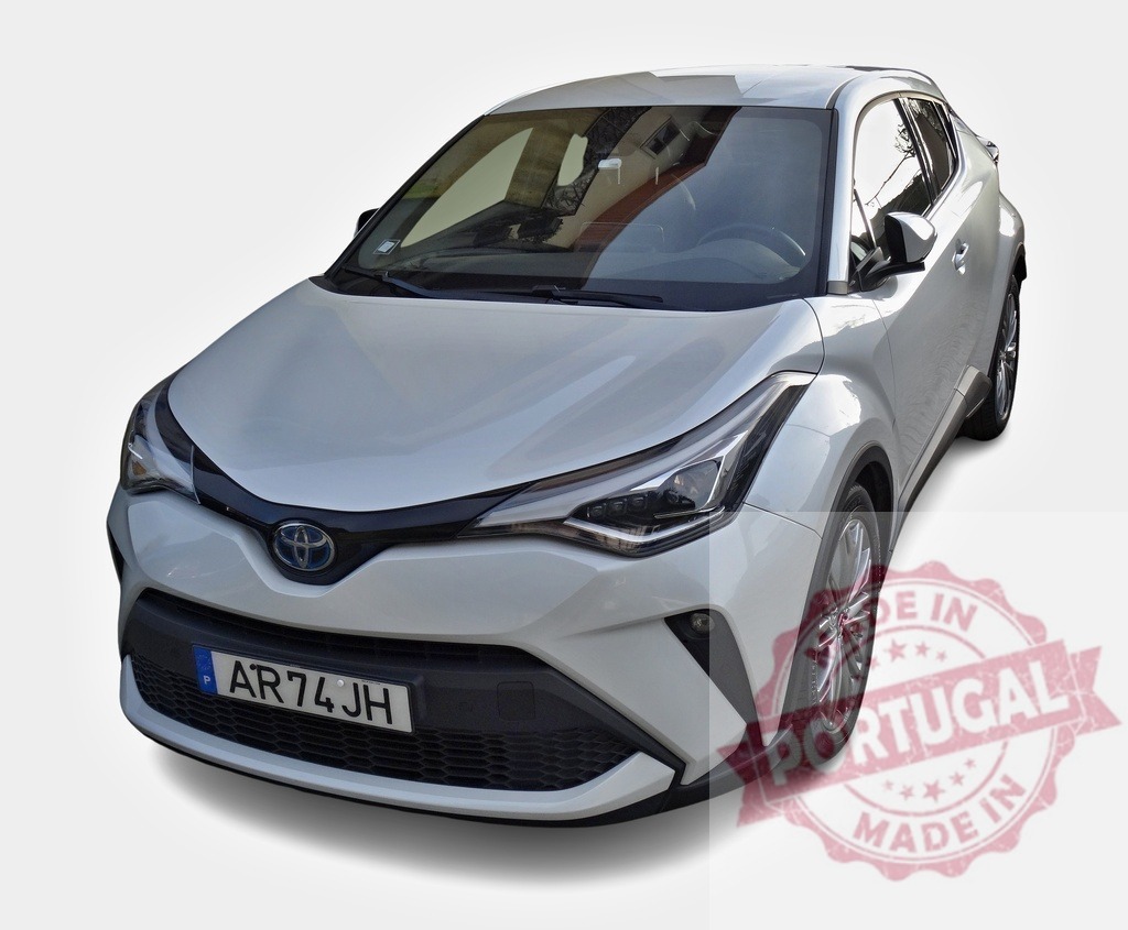 White Toyota C-HR Hybrid crossover posing on a white background | Modern white Toyota C-HR Hybrid crossover posing on a white background in studio - Realized with Pictrs.com