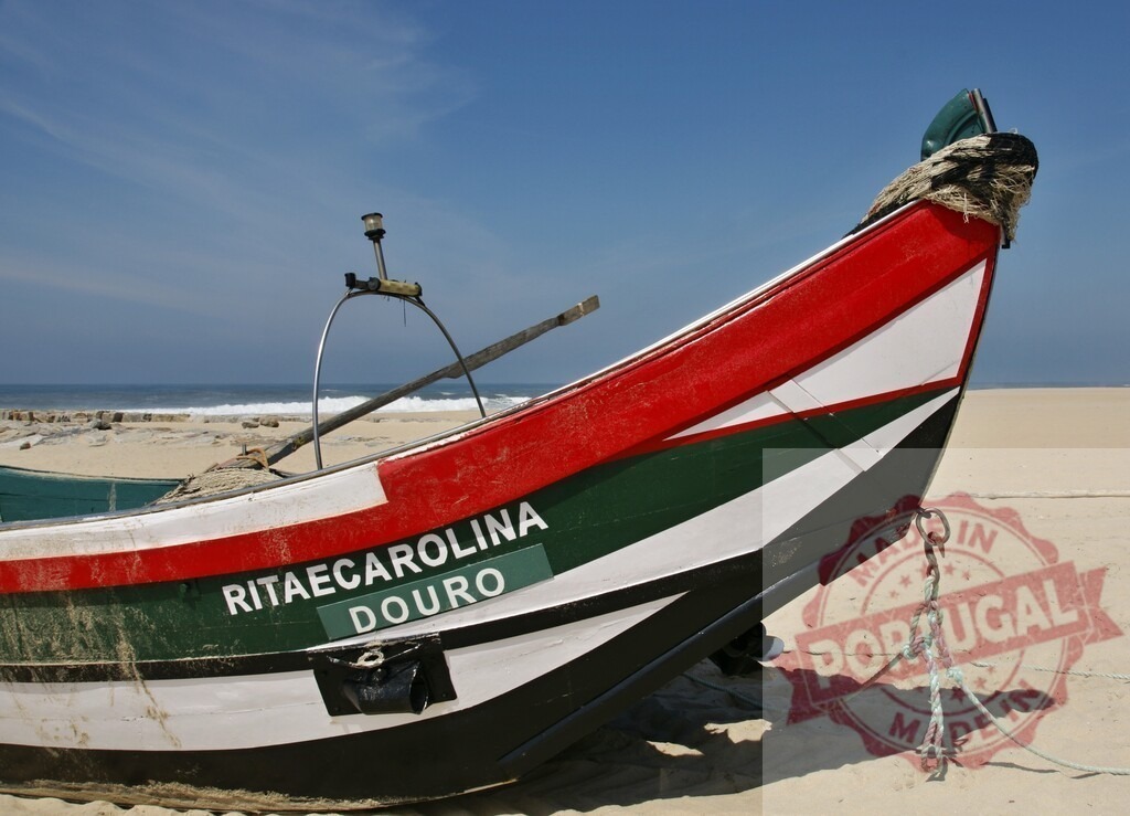 Traditional fishing boat resting on Portuguese beach sand | Colorful wooden fishing boat RITAE CAROLINA Douro beached on a sunny sandy shore - Realized with Pictrs.com