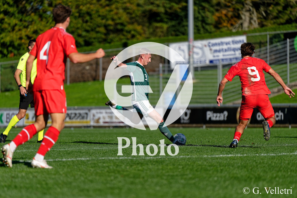 UEFA Region's Cup - NI Western Region v Vaud | Niall Fielding (3 NI Western Region) shoots the ball (action) during the UEFA Region's Cup game between NI Western Region and Vaud at Centre Sportif de Colovray in Nyon, Switzerland 