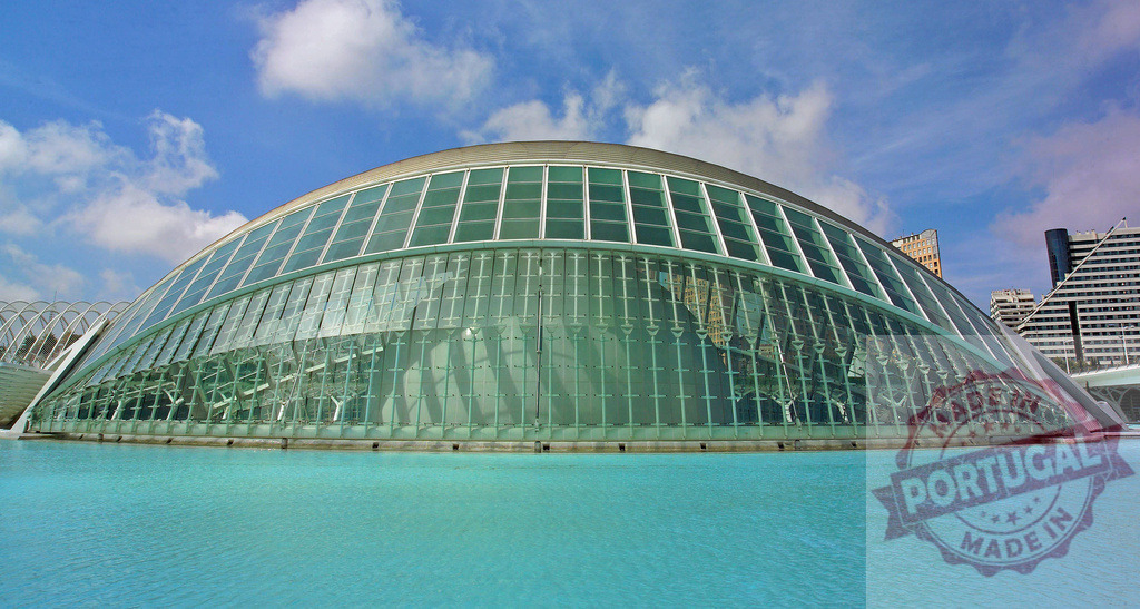 Hemisfèric reflecting in the pool of City of Arts and Sciences in Valencia | Hemisfèric reflecting in the pool of City of Arts and Sciences in Valencia, Spain, under blue sky with white clouds - Realized with Pictrs.com