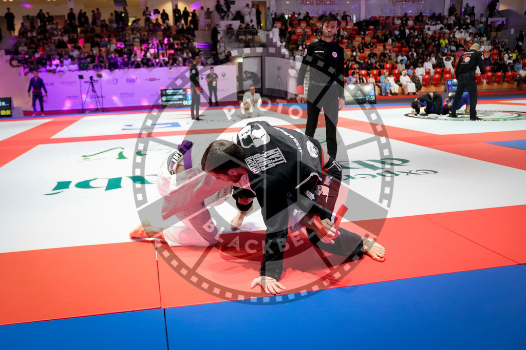 20231109PBB5991 | Fighters compete during the AJP World Professional Championship in the Mubadala Arena in Abu Dhabi, Arab United Emirates, on November 9, 2023.