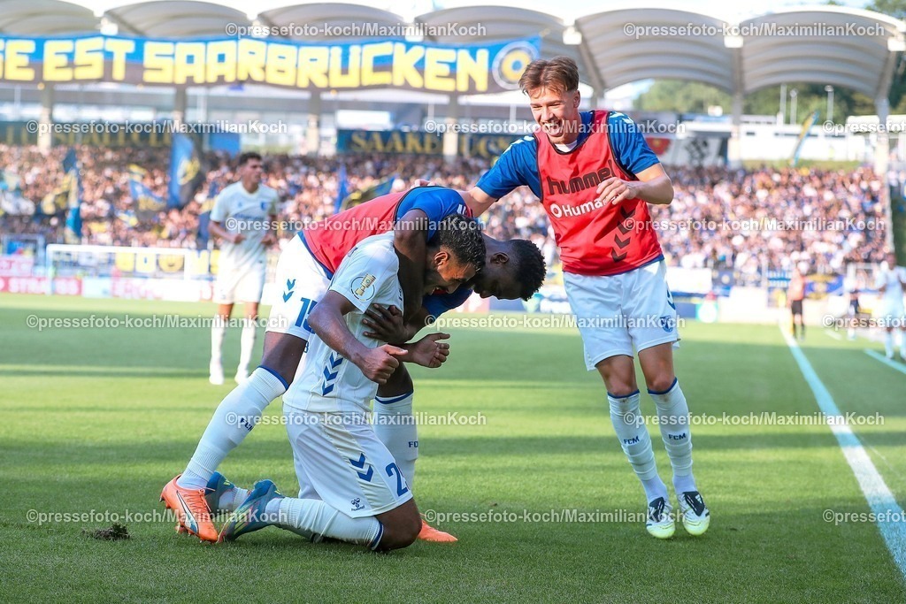 DFB15082501053 | 15.08.2025, Fußball, DFB-Pokal, 1. FC Saarbrücken - 1.FC Magdeburg, Ludwigsparkstadion, Saison 2025 2026: Torjubel nach dem Tor zum 3:0 durch Torschütze Rayan Ghrieb&nbsp;(1FC Magdeburg #29)DFB regulations prohibit any use of photographs as image sequences and or quasi-video.