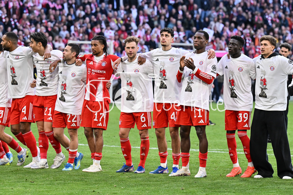 FC Bayern München - VfB Stuttgart | MUNICH, GERMANY - 19. APRIL: the Team form Bayern Munich celebrating - Deutsche Meisterschaft / Deutscher Fussballmeinster / Deutscher Meister after the Bundesliga Match between FC Bayern Munich vs. VfB Stuttgart at Matchday 30 at Allianz Arena / DFL REGULATIONS PROHIBIT ANY USE OF PHOTOGRAPHS AS IMAGE SEQUENCES AND/OR QUASI-VIDEO / Jonathan TAH (FC Bayern Munich 4), Hiroki ITO (FC Bayern Munich 21), Raphael GUERREIRO (FC Bayern Munich 22), Michael OLISE (FC Bayern Munich 17), Joshua KIMMICH (FC Bayern Munich 6), Aleksandar PAVLOVIC (FC Bayern Munich 45), Nicolas JACKSON (FC Bayern Munich 11), Bara NDIAYE (FC Bayer Munich 39), TOM BISCHOF (FC Bayern Munich 20)