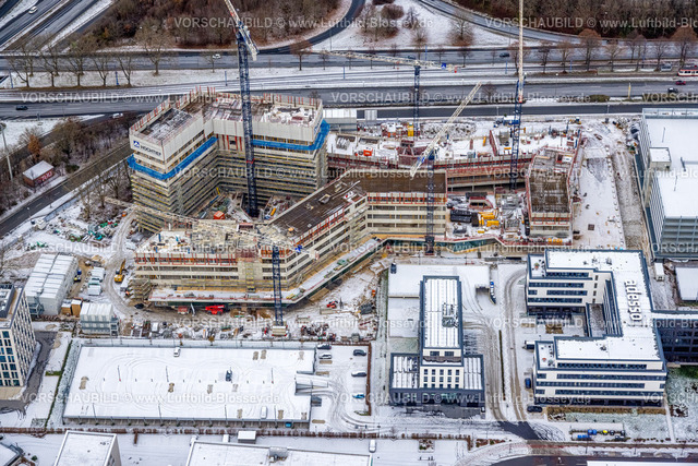 Dortmund221201806 | Luftbild, Winterliche schneebedeckte Stadtkrone-Ost Baustelle und Neubau, Neubau Direktion Continentale, Adesso, Kreuz Westfalendamm B1 und B236, Westfalendamm, Dortmund, Ruhrgebiet, Nordrhein-Westfalen, Deutschland