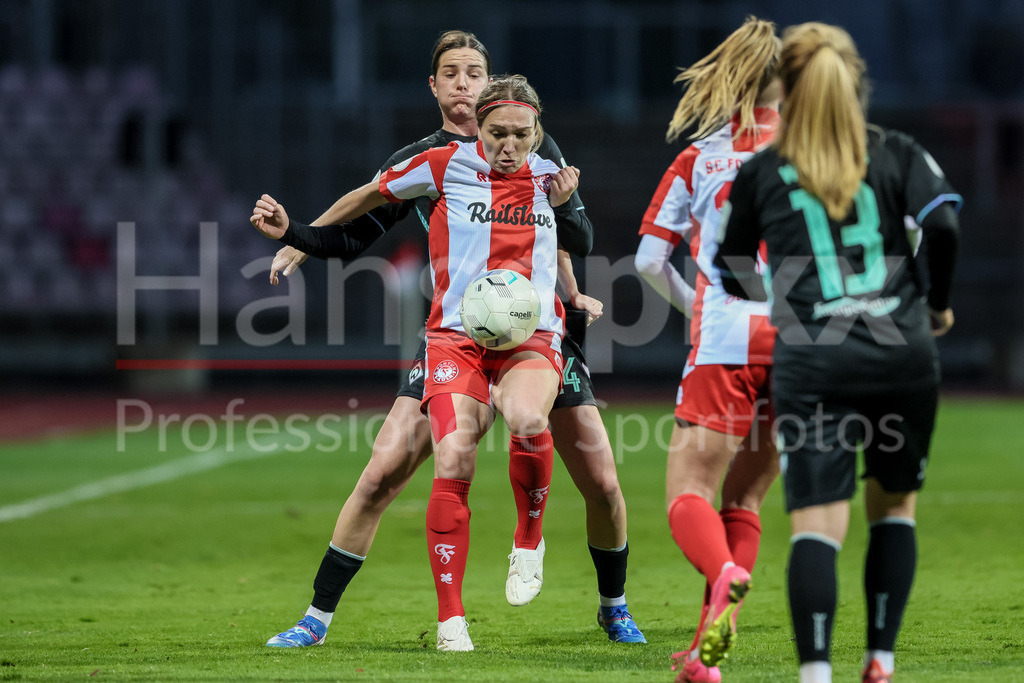 Fussball, DFB-Pokal Frauen, SC Fortuna Köln - SV Werder Bremen | v.li.: Lara Schmidt (SV Werder Bremen, 24) und Svenja Streller (SC Fortuna Köln, 16) im Zweikampf, Duell, Dynamik, Aktion, Action, Spielszene, DIE DFB-RICHTLINIEN UNTERSAGEN JEGLICHE NUTZUNG VON FOTOS ALS SEQUENZBILDER UND/ODER VIDEOÄHNLICHE FOTOSTRECKEN. DFB REGULATIONS PROHIBIT ANY USE OF PHOTOGRAPHS AS IMAGE SEQUENCES AND/OR QUASI-VIDEO.