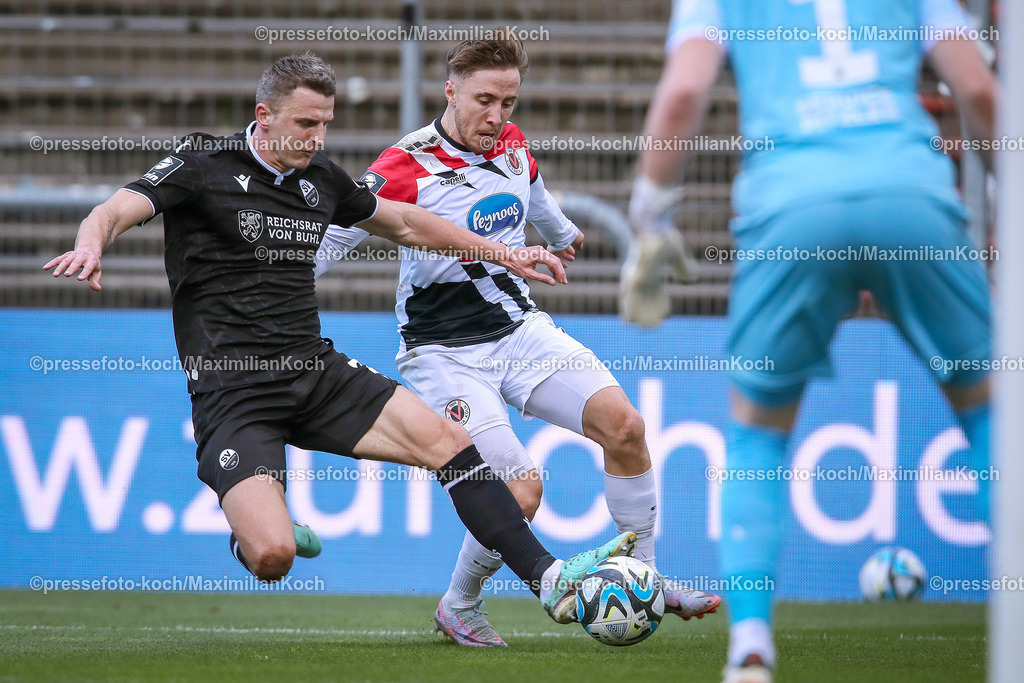 Koe3Liga24022401016 | 24.02.2024, Köln, Fußball, bwin 3. Liga Herren, Sportpark Höhenberg, 27. Spieltag, Saison 2023 2024, FC Viktoria Köln – SV Sandhausen: Edvinas Girdvainis (SV Sandhausen) gegen Luca Marseiler (Viktoria Köln). 
DFB regulations prohibit any use of photographs as image sequences and or quasi-video.