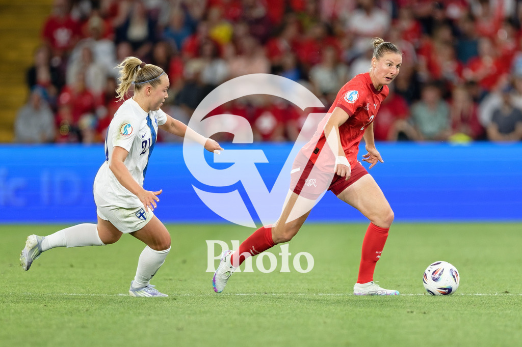 Finland v Switzerland: UEFA Women's EURO 2025 Group A | GENEVA, SWITZERLAND - JULY 10: Julia Stierli of Switzerland (R) runs with the ball under pressure from Oona Sevenius of Finland (L) during the UEFA Women's EURO 2025 Group A match between Finland and Switzerland at Stade de Geneve on July 10, 2025 in Geneva, Switzerland. (Photo by Giuseppe Velletri/Sports Press Photo/Getty Images)