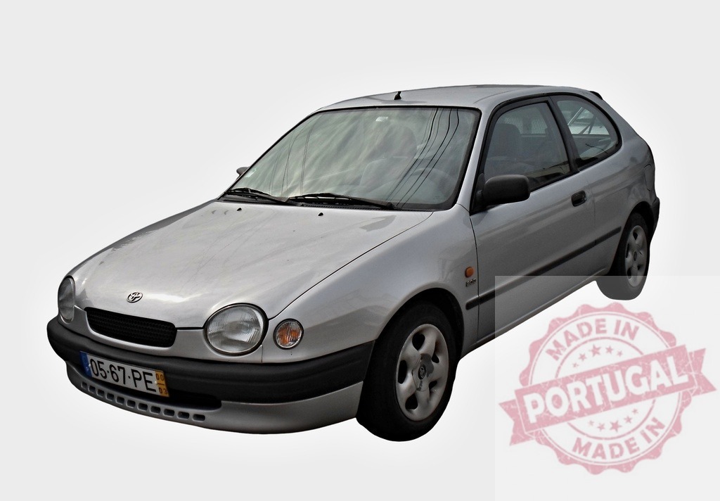 Silver Toyota Corolla E11 showing its front on white background | Three-door hatchback Toyota Corolla E11 with a 1.3 liter petrol engine, produced from 1995 to 2002, isolated on white - Realized with Pictrs.com