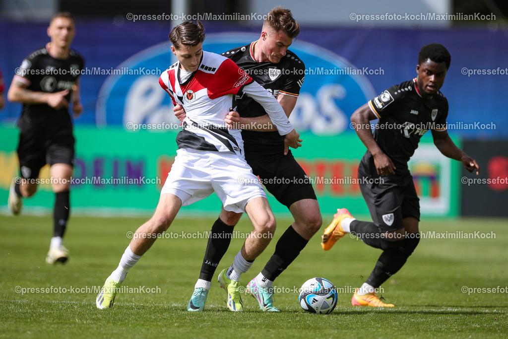 Koe3Liga27042402164 | 27.04.2024, Köln, Fußball, bwin 3. Liga Herren, Sportpark Höhenberg, 35. Spieltag, Saison 2023 2024, FC Viktoria Köln – Preußen Münster: Malek El Mala (Viktoria Köln) gegen Niko Koulis (Preußen Münster). 
DFB regulations prohibit any use of photographs as image sequences and or quasi-video.