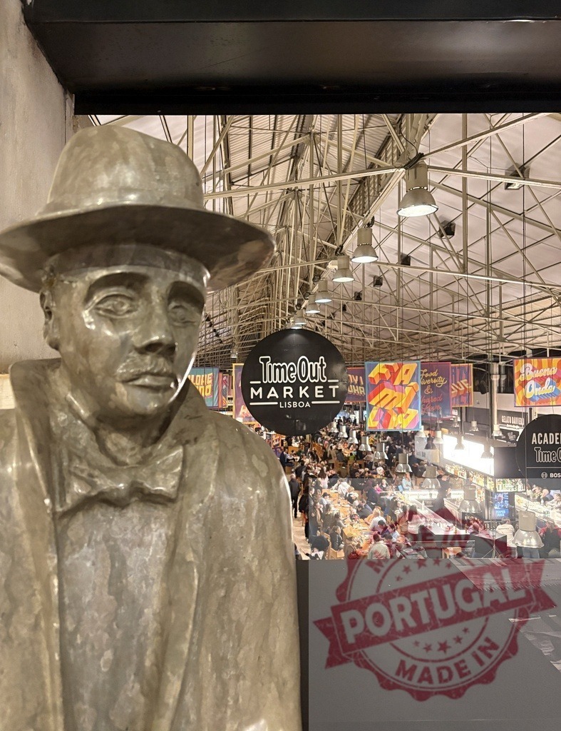 Fernando Pessoa statue overlooking Time Out Market Lisboa | Fernando Pessoa statue seeing the busy food hall in Time Out Market Lisboa - Realized with Pictrs.com