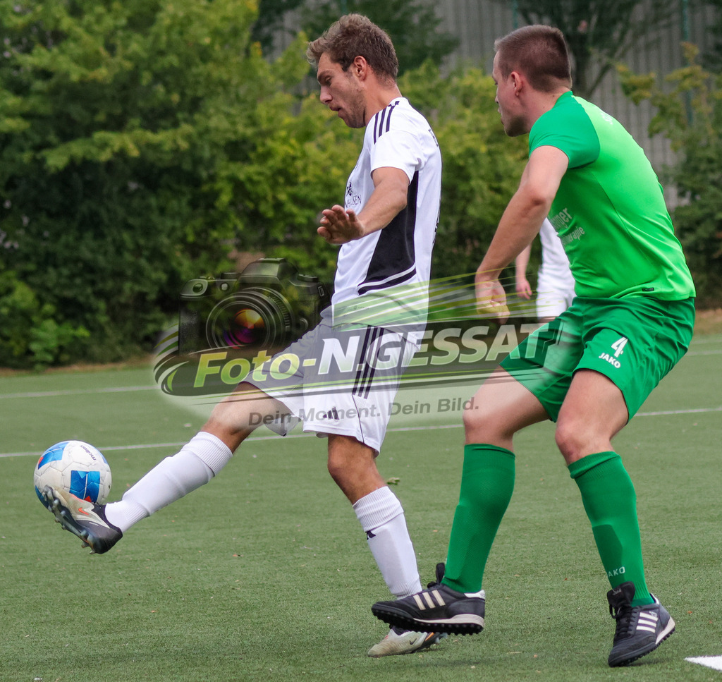 SC Bünde - TuS Bexterhagen | Auf dem Bild zu sehen: grün SC Bünde: ; weiß TuS Bexterhagen:  SC Bünde, TuS Bexterhagen, Saison 26/27, Testspiel, Hunnebrock, Deutschland - Realisiert mit Pictrs.com