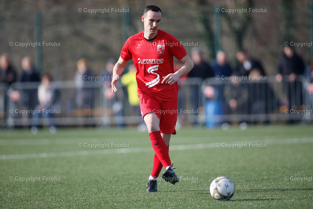 A_LUI_02032024_09 | SPORT,FUSSBALL LT1 OOE LIGA ASKOE OEDT-SV HAIDLMAIR GRUEN WEISS MICHELDORF 02.03.2024 IM BILD: FLORIAN MADLMAYR (OEDT) UND (MICHELDORF) FOTO:FOTOLUI