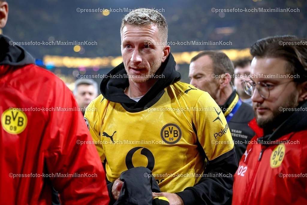 UCL10122501105 | 10.12.2025, Fußball, UEFA Champions League, Borussia Dortmund - FK Bodö/Glimt, BVB Stadion, 5. Spieltag, Saison 2025 2026: Marco Reus mit BVB Fantrikot Trikot von Karim Adeyemi (BVB #27)  Regulations prohibit any use of photographs as image sequences and or quasi-video.