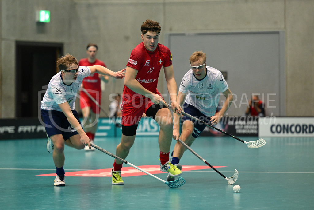 Switzerland B U19 vs Finland U19 - 2. February 2024 | Switzerland B U19 vs Finland U19
U19 Men International Matches in Switzerland
GoEasy Arena, Siggenthal Station
Switzerland forward #20 Jamie Martinjas in front of Finland forward #5 Teemu Halmela and Finland forward #12 Joona Kajaala.
Credit: Markus Aeschimann | <a href="https://www.markus-aeschimann.ch">Sportfotografie Markus Aeschimann</a> | <a href="https://www.instagram.com/sportfotografie.aeschimann">@sportfotografie.aeschimann</a> - Realisiert mit Pictrs.com