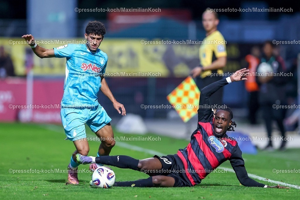 FCVK16092501109 | 16.09.2025, Fußball, FC Viktoria Köln – TSG 1899 Hoffenheim II, 3.Liga, Sportpark Höhenberg, Saison 2025 2026: Ayoube Amaimouni-Echghouyab&nbsp;(Hoffenheim II #07) im Zweikampf gegen  Yannick Tonye&nbsp;(Viktoria Koeln #30)  DFB regulations prohibit any use of photographs as image sequences and or quasi-video.
