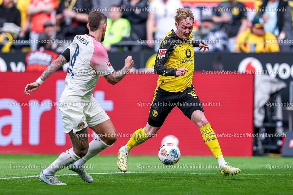 BVB11042601029 | 11.04.2026, Fußball, Borussia Dortmund - Bayer 04 Leverkusen, 1. Fußball Bundesliga, 29. Spieltag, Signal Iduna Park, Saison 2025 2026: Julian Brandt&nbsp;(BVB #10) im Zweikampf gegen  Robert Andrich&nbsp;(Bayer04 Leverkusen #08)  DFB regulations prohibit any use of photographs as image sequences and or quasi-video.