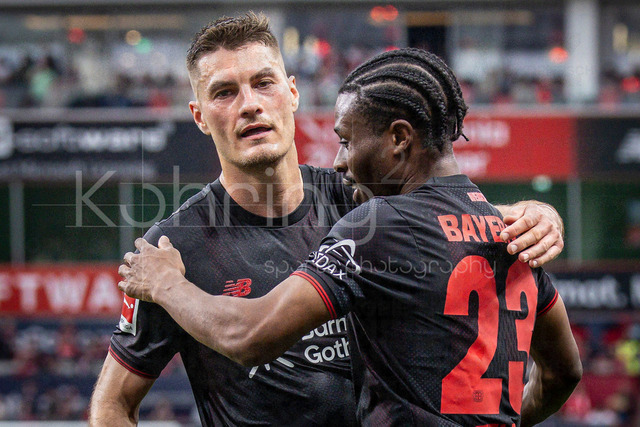 German Bundesliga, Bayer 04 Leverkusen vs. RB Leipzig, 02.05.2026 | LEVERKUSEN, GERMANY - MAY 2, 2026 :  Nathan Tella (Bayer 04 Leverkusen, 23) celebrates scoring his team's second goal with Patrik Schick (Bayer 04 Leverkusen, 14) during the German Bundesliga match on gameday 32 between Bayer 04 Leverkusen vs. RB Leipzig at BayArena on May 2, 2026 in Leverkusen, Germany. DFL REGULATIONS PROHIBIT ANY USE OF PHOTOGRAPHS AS IMAGE SEQUENCES AND/OR QUASI-VIDEO.